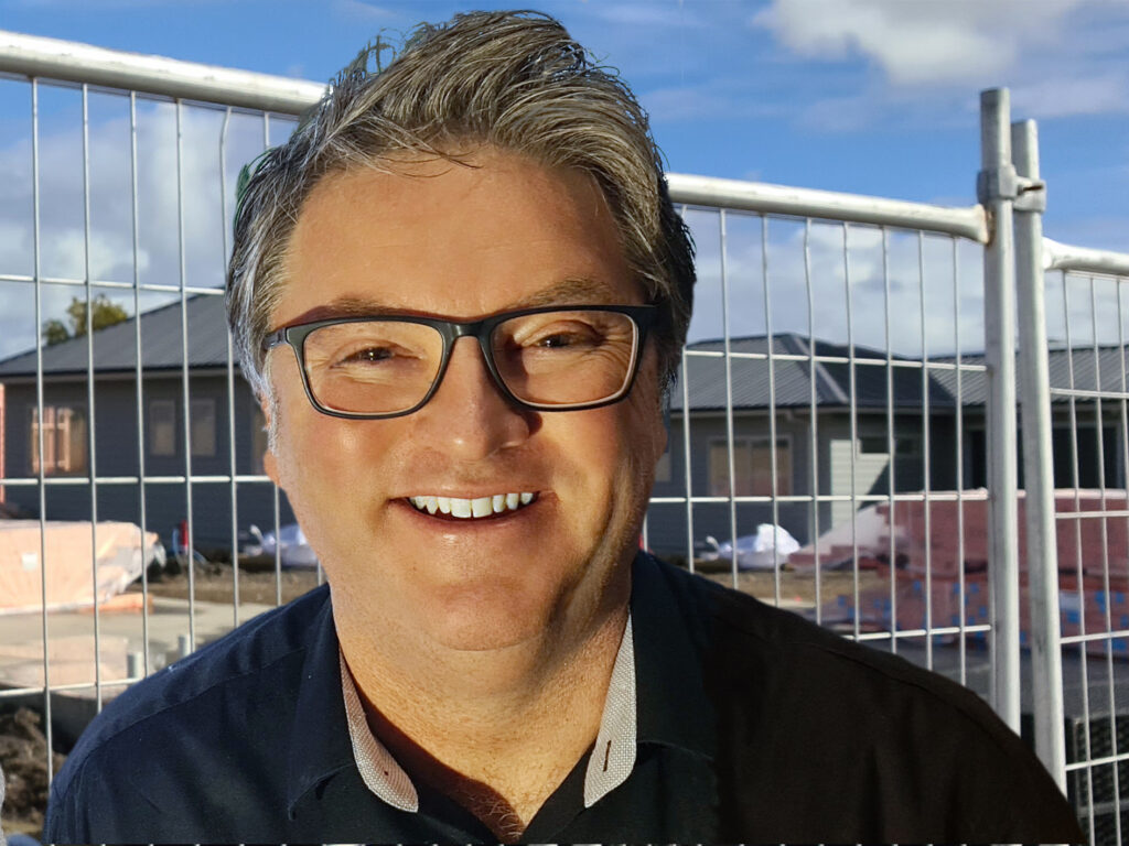 COM - Rob McCann infront of buildings copy