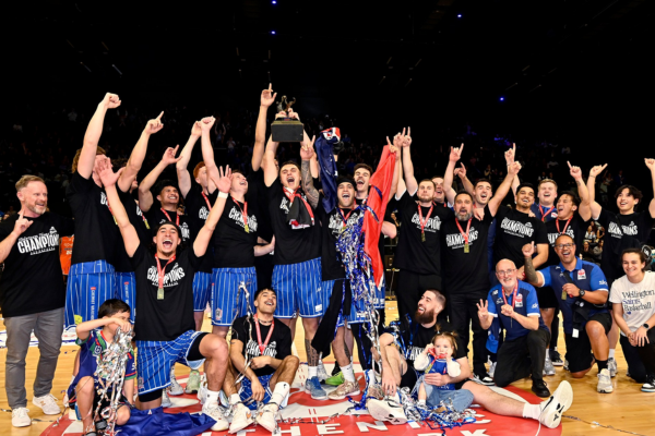 Wellington Saints Celebrate 2025 NBL Championship Victory Wellington Saints players and staff celebrating their NBL championship win on court at TSB Arena.