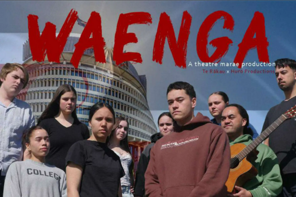 Group of Porirua rangatahi standing in front of the Beehive, promoting the theatre production Waenga.