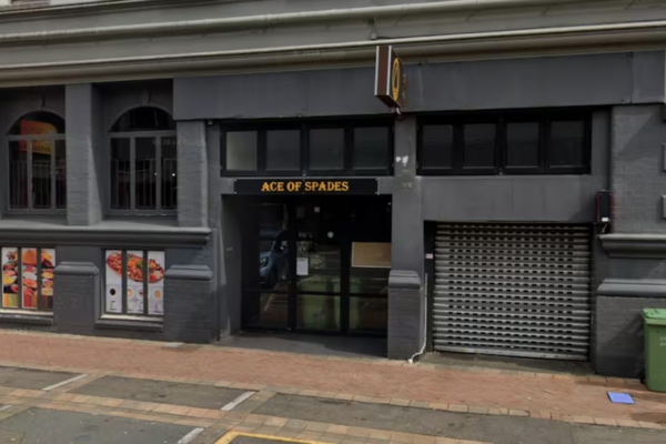 Police officers outside the Ace of Spades bar in Wellington, where a stabbing occurred during an early morning altercation.