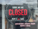 Closed sign displayed on the door of Pepe’s Cafe in Porirua.