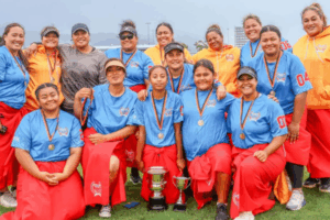 Members of the Porirua United Kirikiti Club pose with trophies after winning the inaugural Malaeola Women’s Kirikiti Tournament, the Wellington region’s first women’s-only kirikiti competition.