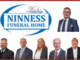 Promotional image for Ninness Funeral Home featuring the company logo and a group of six professionally dressed staff members posed against a light background.