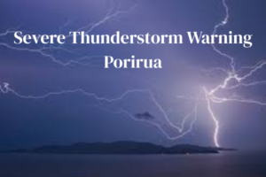 Lightning strikes over Porirua harbour beneath a dark stormy sky, with bold text reading “Severe Thunderstorm Warning Porirua”.