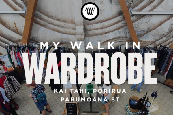 Overhead view of a clothing market inside Kai Tahi in Porirua, with racks of garments and shoppers browsing beneath a curved ceiling. Large text reads “My Walk in Wardrobe” with location details below.