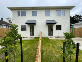 New two-storey state homes on Cornwall Crescent with fenced lawns and concrete driveways.