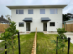 New two-storey state homes on Cornwall Crescent with fenced lawns and concrete driveways.
