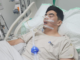 Ashen Phaipanya lies in a hospital bed in Bali ICU with medical tubes attached while being treated for meningitis.