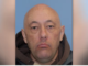 Police-issued head-and-shoulders photograph of missing man Jeremy Robertson against a blue background. Police are carrying out a final planned search in the Rotorua Blue and Green Lakes area.