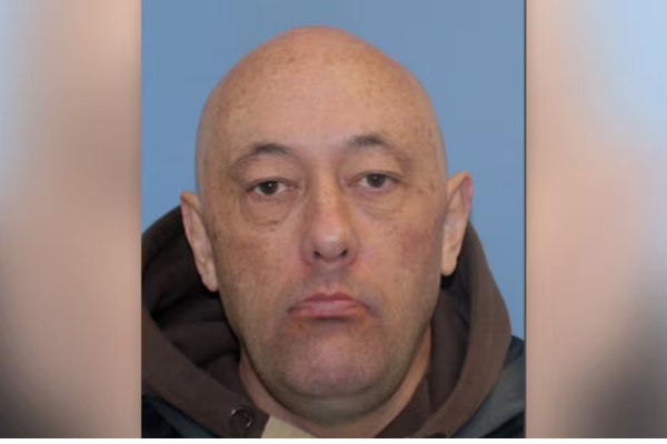 Police-issued head-and-shoulders photograph of missing man Jeremy Robertson against a blue background. Police are carrying out a final planned search in the Rotorua Blue and Green Lakes area.
