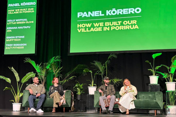 Four local business owners take part in a panel kōrero on stage at Porirua BizFest 2026.