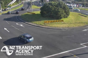 Traffic moving through a Porirua state highway roundabout, viewed from an NZTA traffic camera.