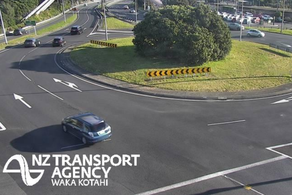 Traffic moving through a Porirua state highway roundabout, viewed from an NZTA traffic camera.