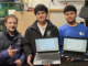 Daniel Talbot from Wellington Severe Weather Reports with Porirua College students who received donated laptops to support their education.