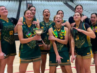 Mana College senior girls basketball team celebrating their College Sport Wellington Premier Girls championship win, with players holding the trophy and wearing medals.
