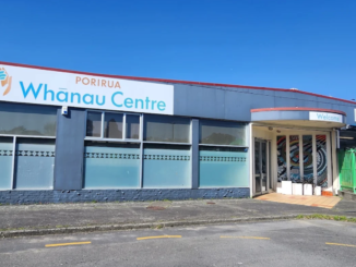 Exterior view of Porirua Whānau Centre building with the centre sign visible above the entrance.