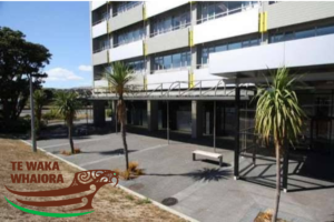 Te Waka Whaiora building in Porirua, with the organisation’s logo displayed in the lower left of the image.