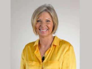 Former Porirua City Councillor Tracy Johnson smiling for a portrait.
