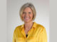 Former Porirua City Councillor Tracy Johnson smiling for a portrait.