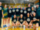 Mana College Senior Girls basketball team posing together on court after winning the Zone 3 Lower North Island championship.