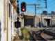 Red railway signal illustrating the stop signal passed by a Porirua passenger train at Plimmerton.