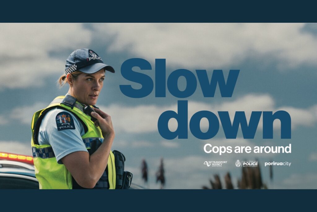 Road safety campaign graphic showing a police officer beside the words Slow down, Cops are around, with Police, NZTA and Porirua City logos.