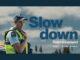 Road safety campaign graphic showing a police officer beside the words Slow down, Cops are around, with Police, NZTA and Porirua City logos.